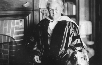 Photo of American songwriter Katharine Lee Bates with her dog