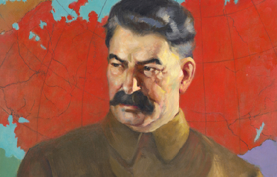 Dictator Joseph Stalin and a map of the Soviet Union